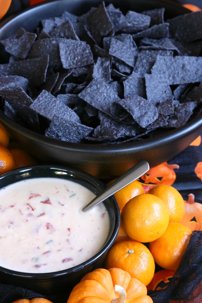 black tortilla chips and queso