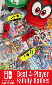 A collection of Nintendo Switch video games spread out with Nintendo Switch Joy-Cons on top of the games and a Mario Brothers hat in the top right corner.
